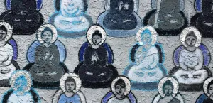 a series of Buddha statues in various colors