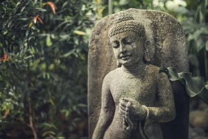 a Buddha statue made of stone