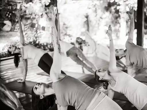 unnamed a group of people doing yoga moves, with several different poses